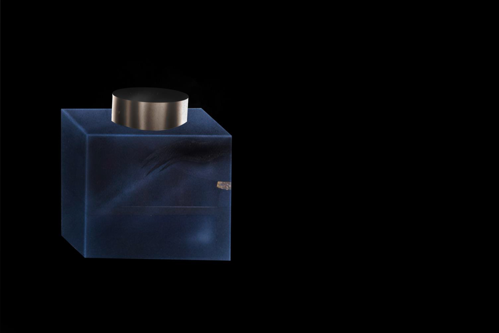 An illustration of an ink well on a black background. The ink well is dark blue and has brass lid. The illustration has been painted with an air brush.